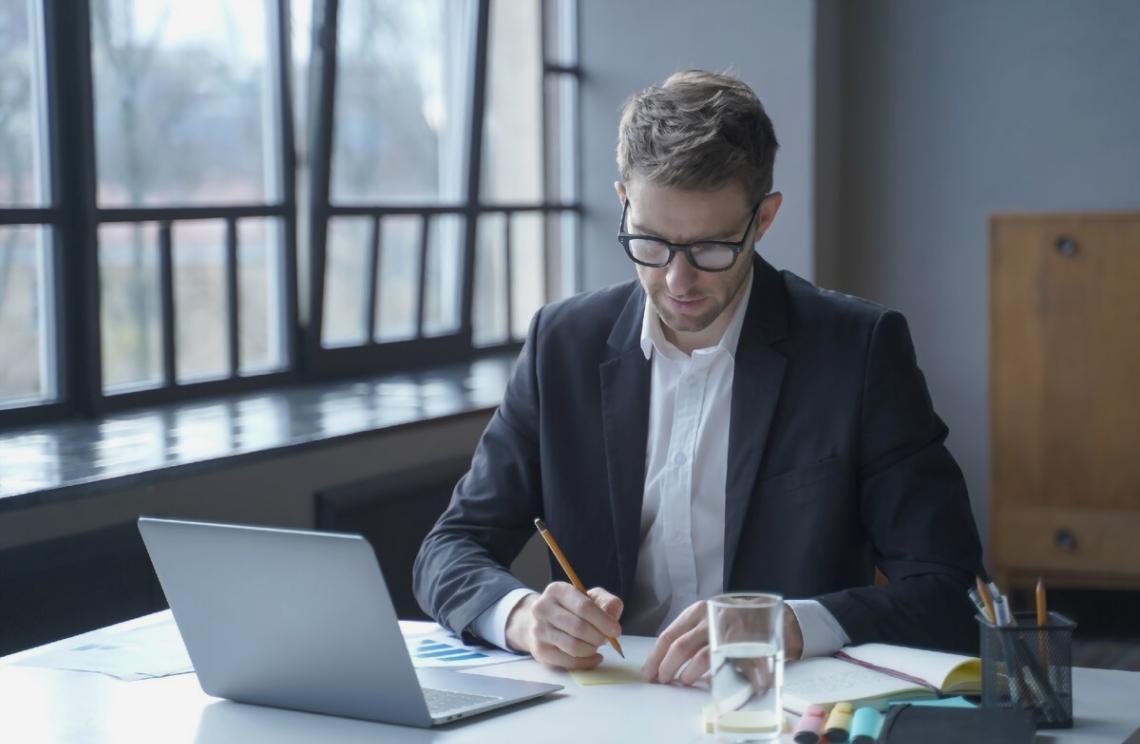 Financial planning workspace with charts and analysis documents