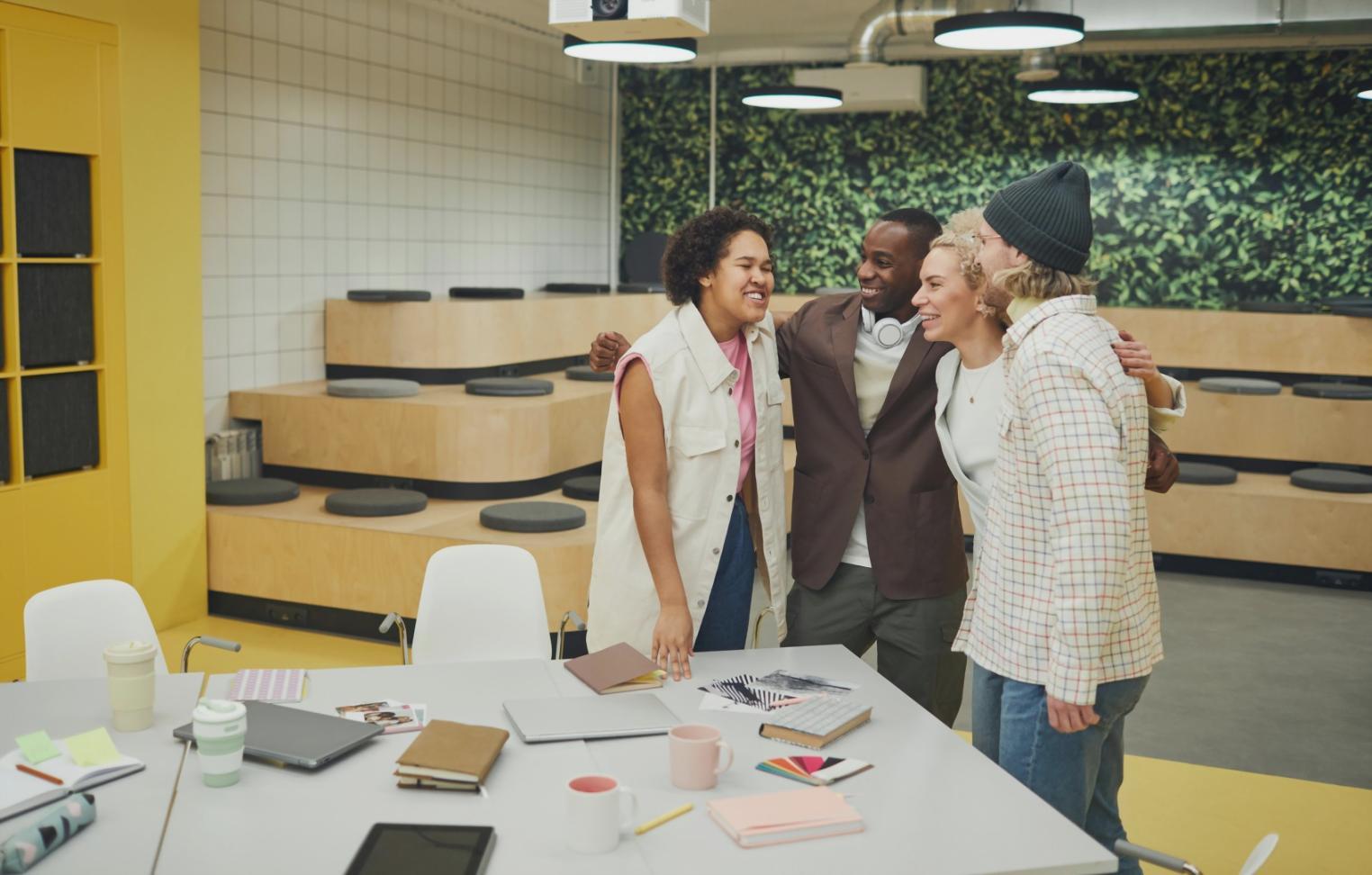 Startup team reviewing financial projections and growth metrics during advisory session