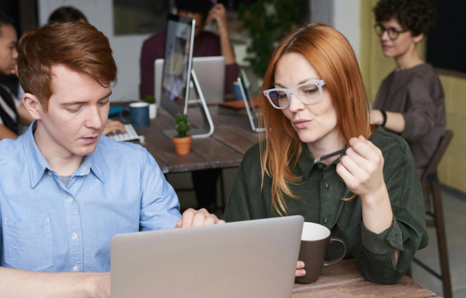 Founders discussing financial strategies during interactive workshop session